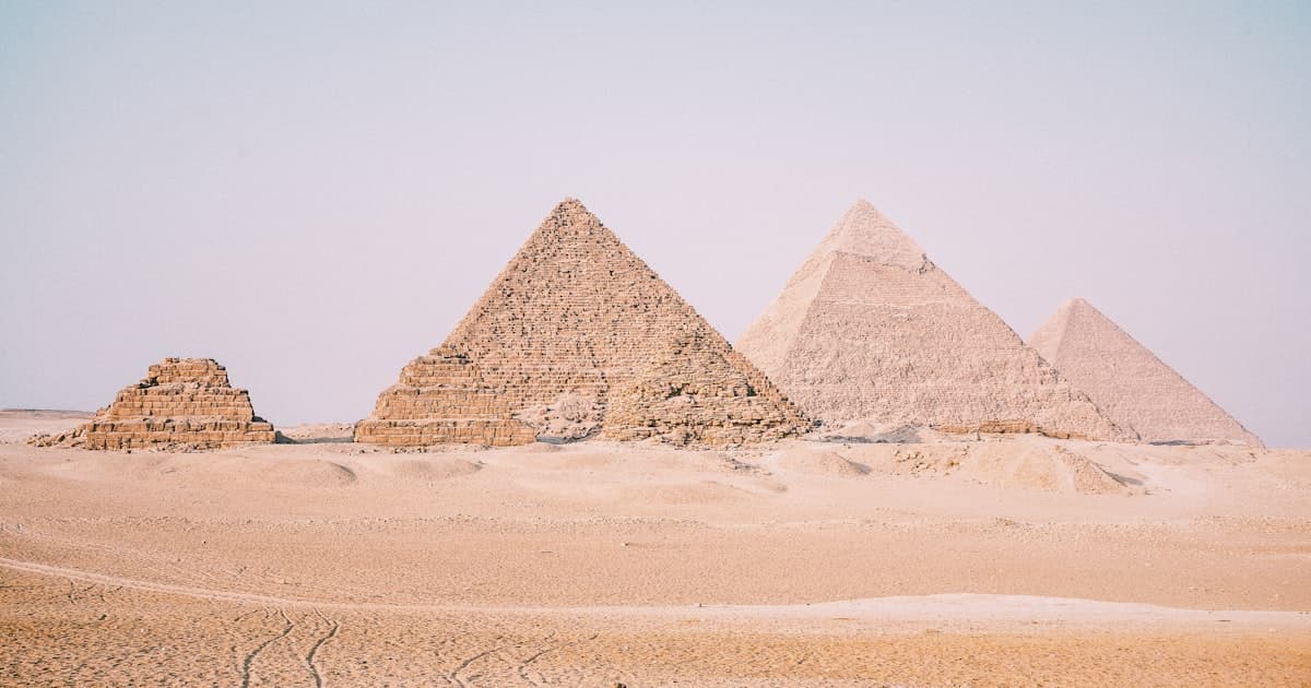 Ecommerce business setup in Egypt with laptop and Egyptian marketplace